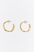 Maxi golden irregular hoop earrings