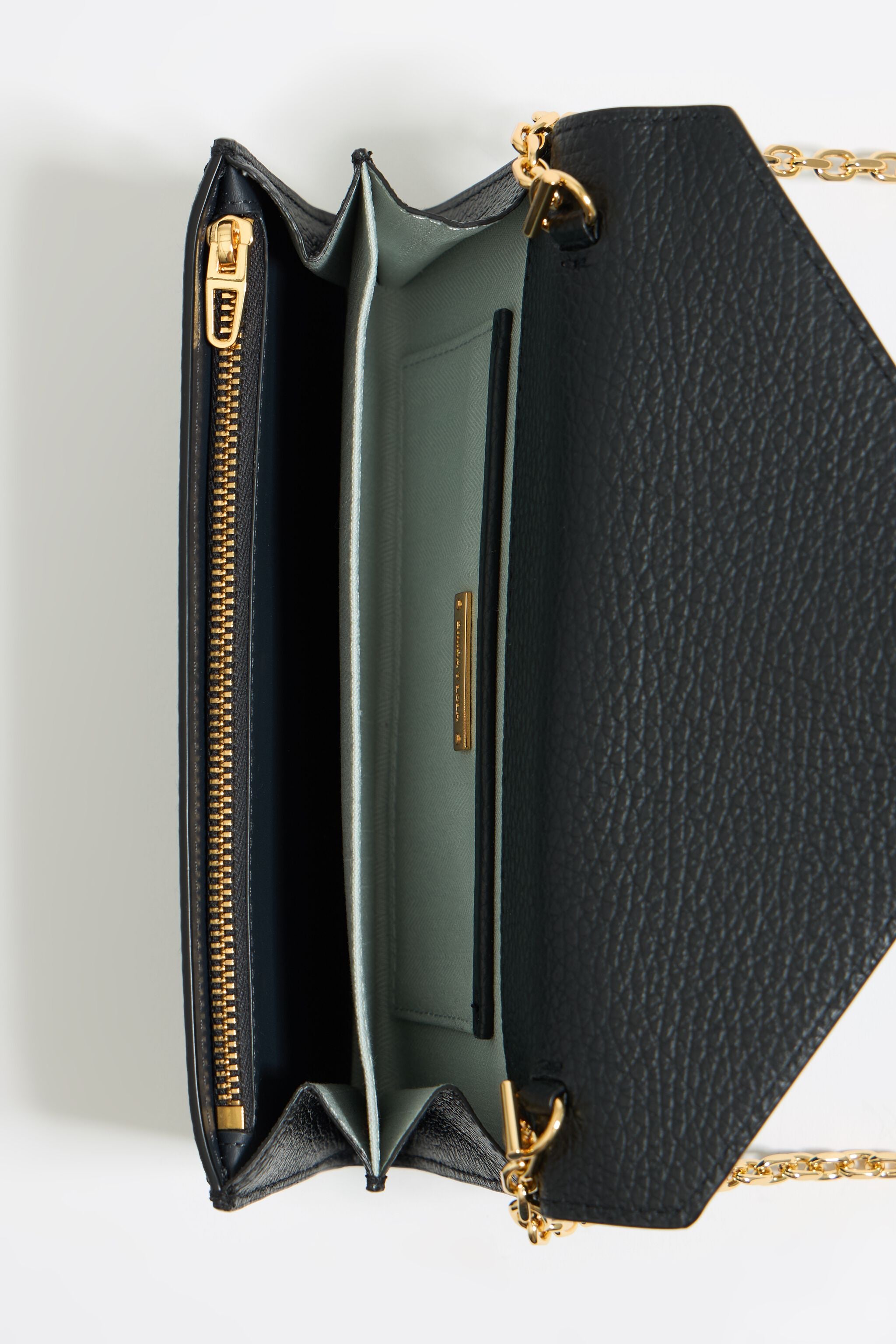 Mini black leather flap bag
