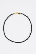 Logo and black crystals necklace