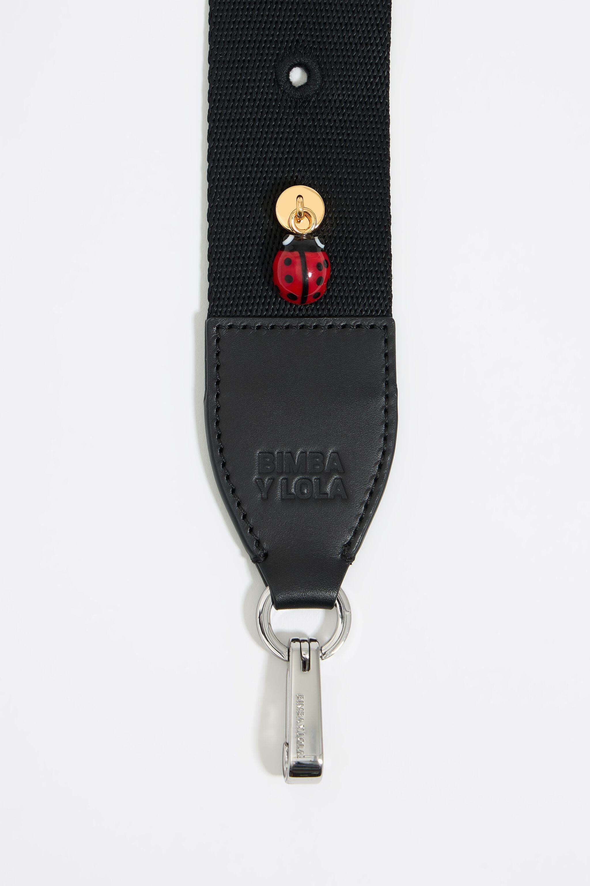 Red glass ladybug bag charm