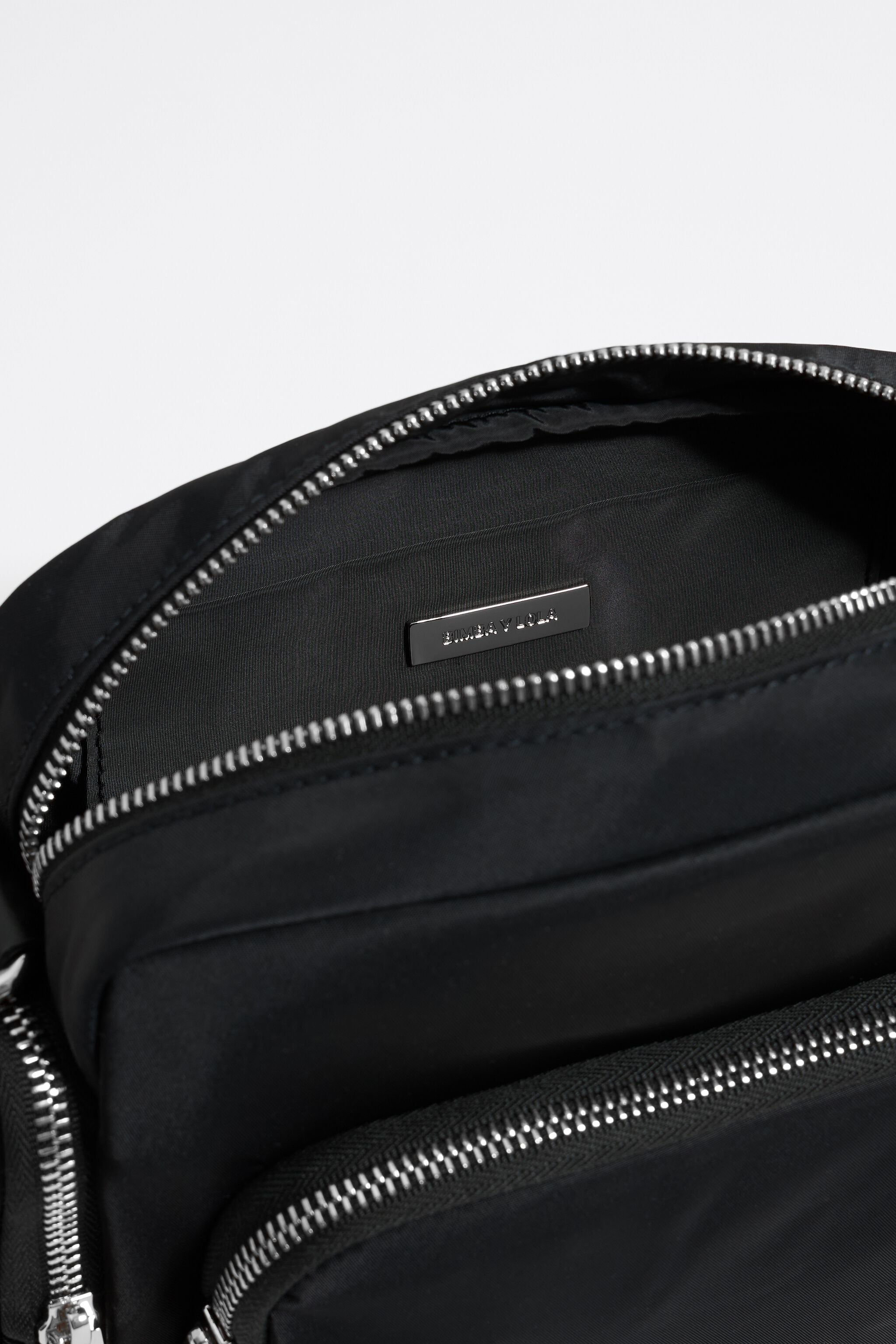 Medium black multi-pocket crossbody bag