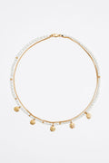 Gold coin logo and pearl necklace