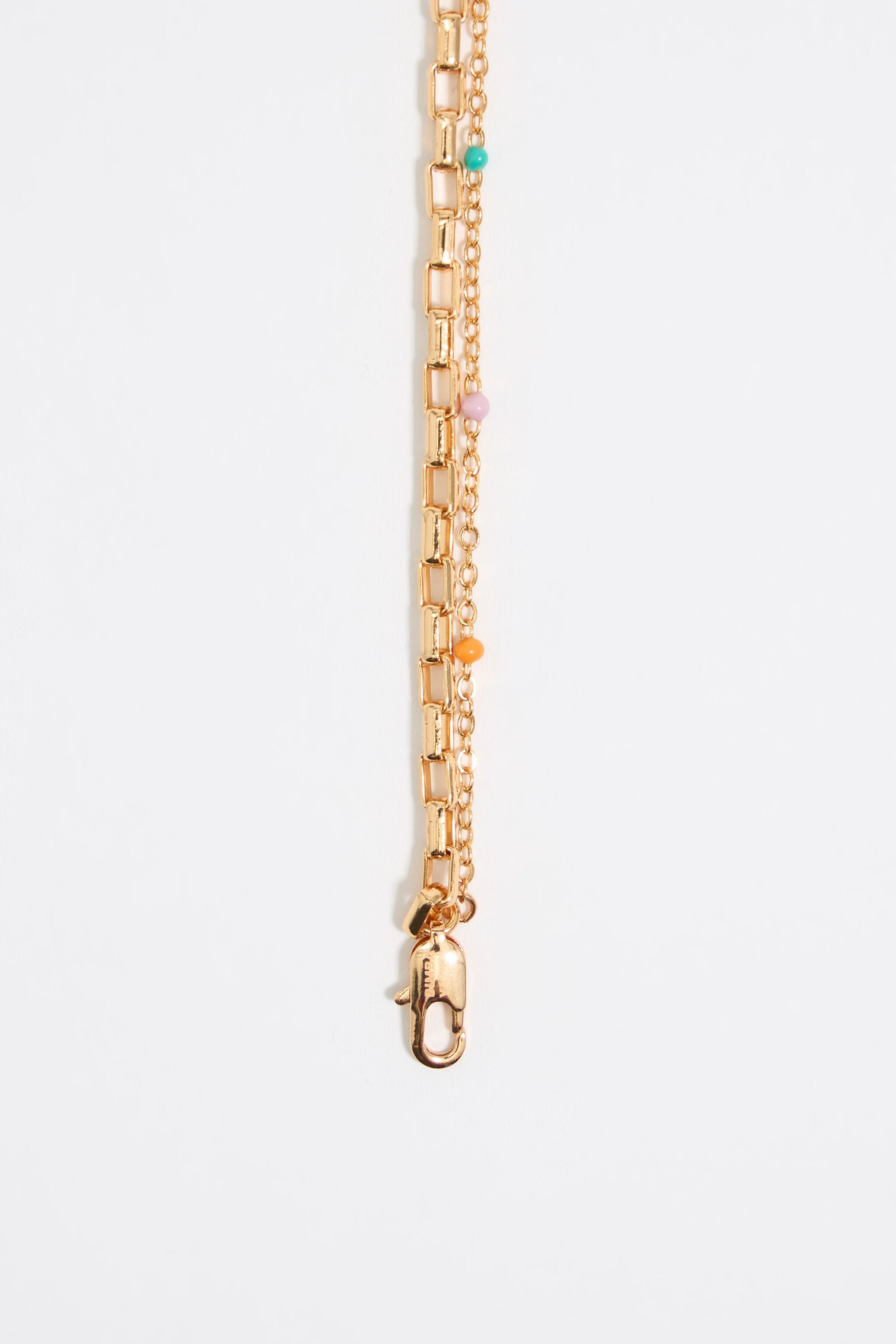 Gold layered chain and fish necklace