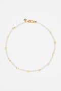 Gold marine motifs and pearl necklace