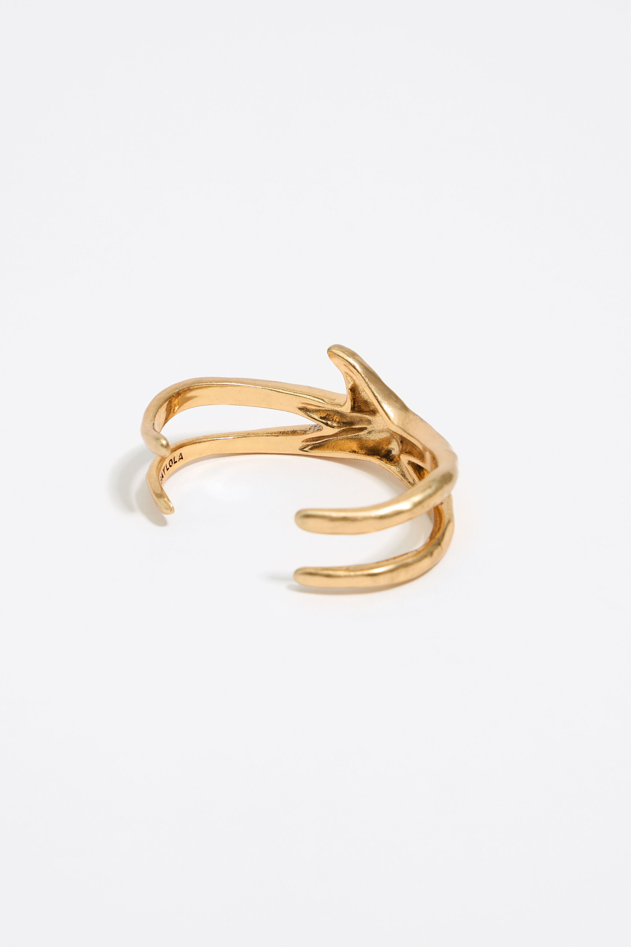Aged finish textured gold-tone metal star bracelet
