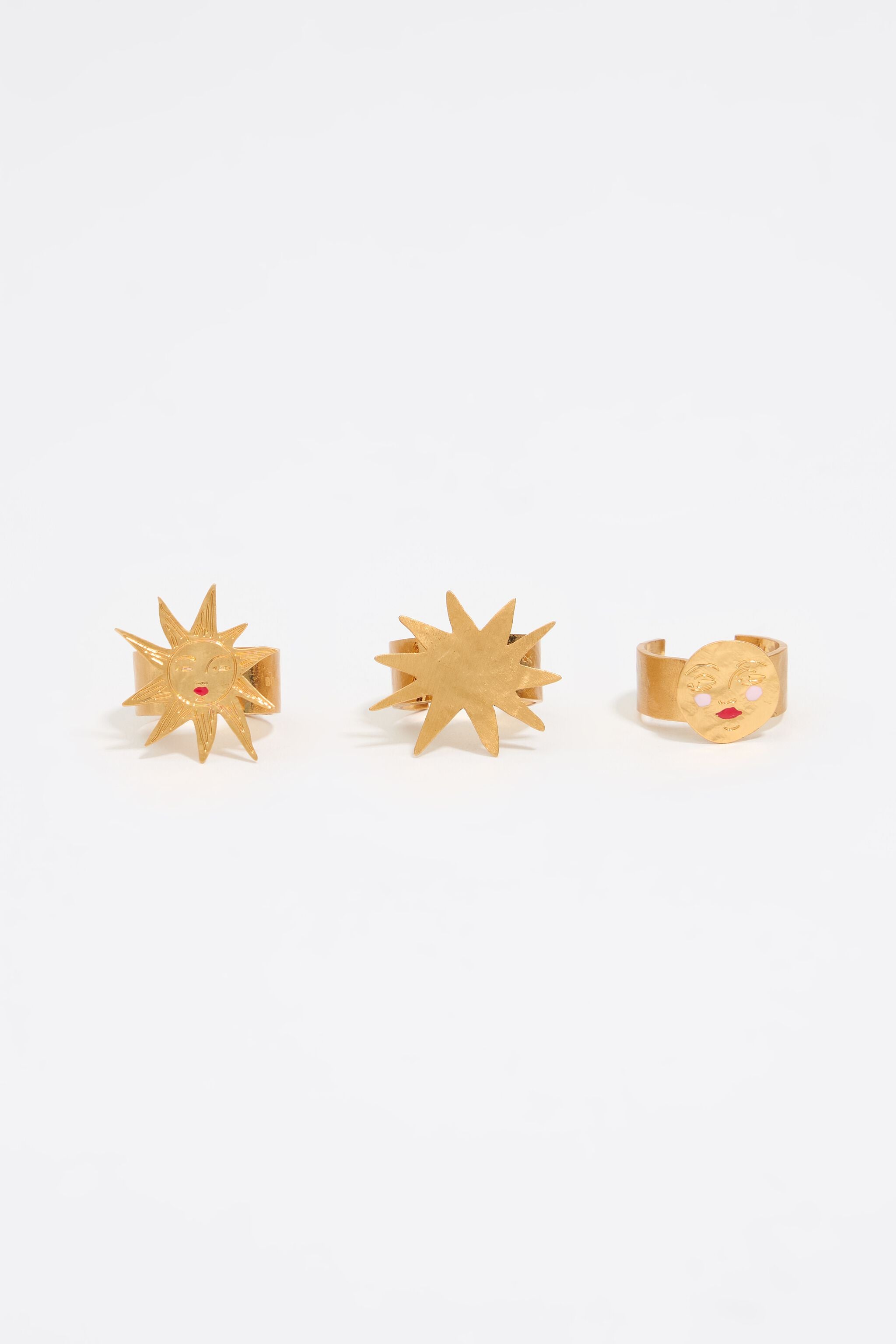 Set of three gold sun and moon rings
