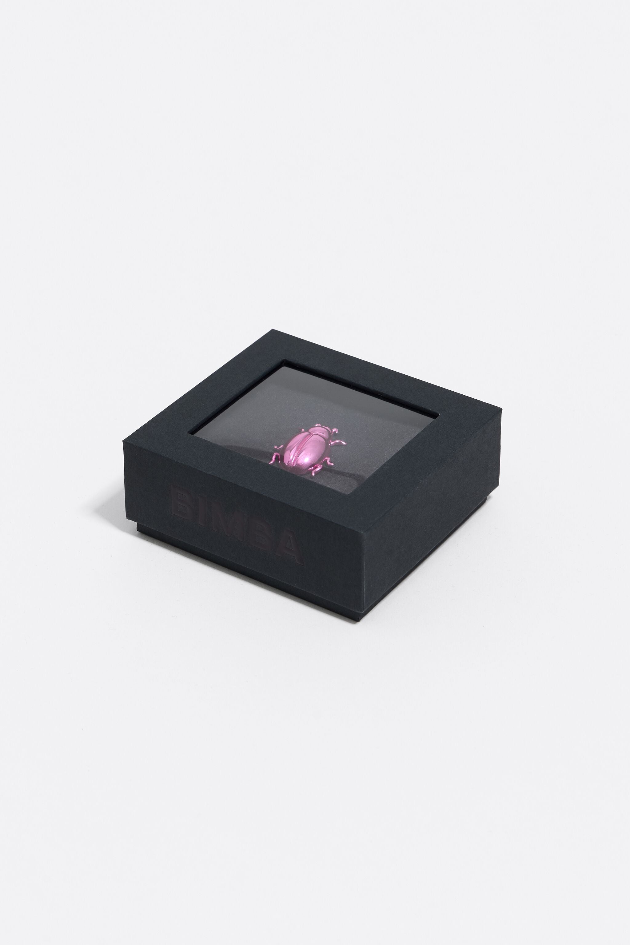 Pink beetle charm