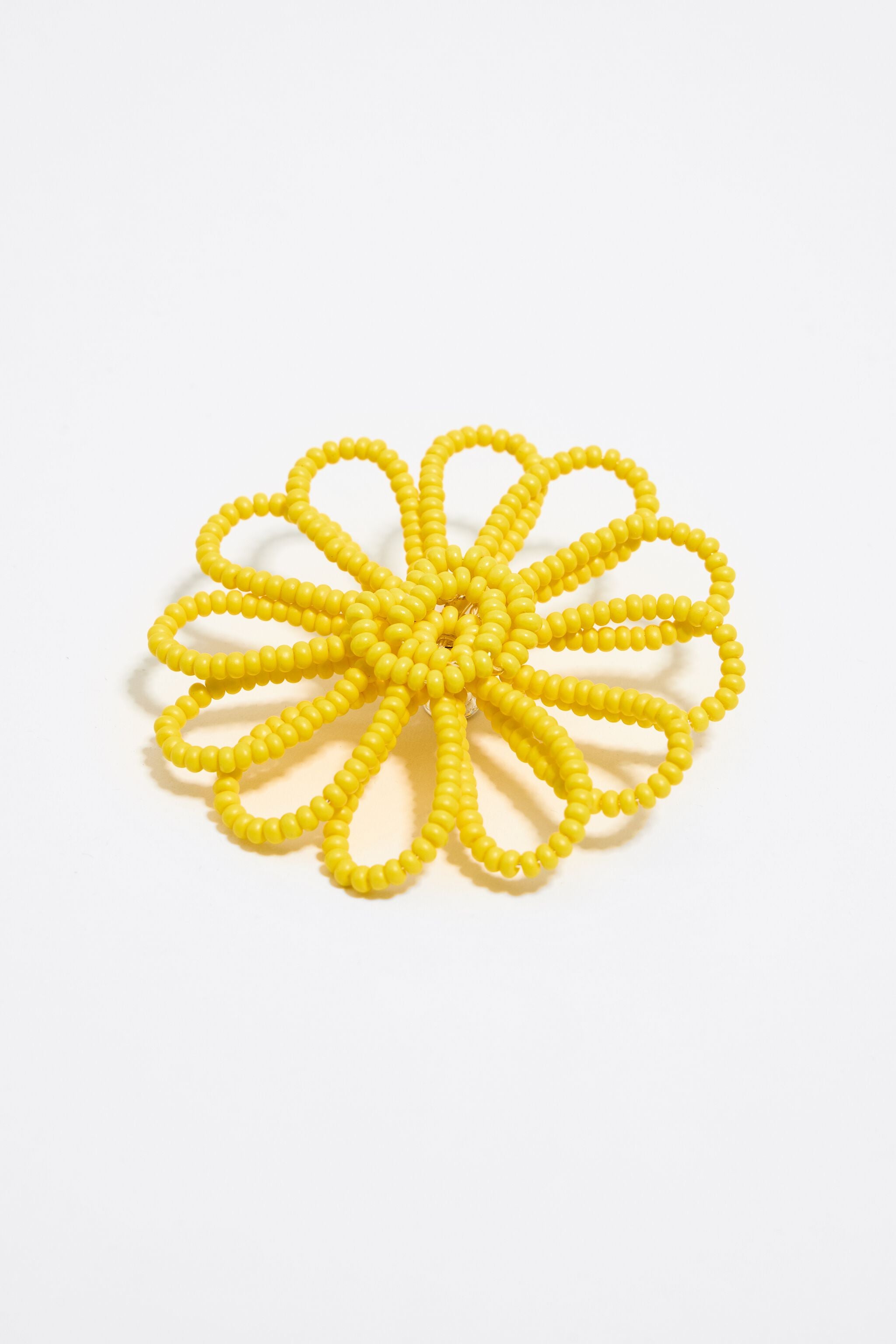 Yellow beaded flower charm