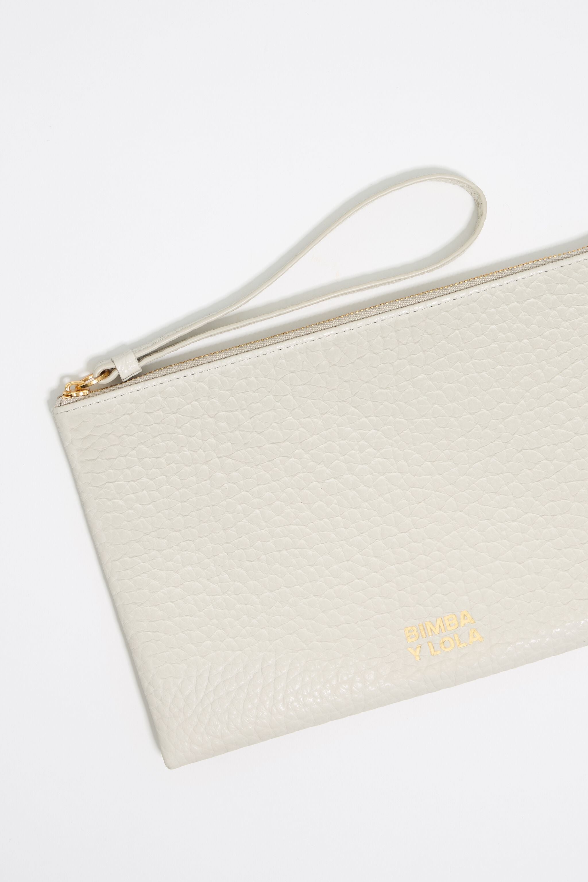 Off-white leather make-up case