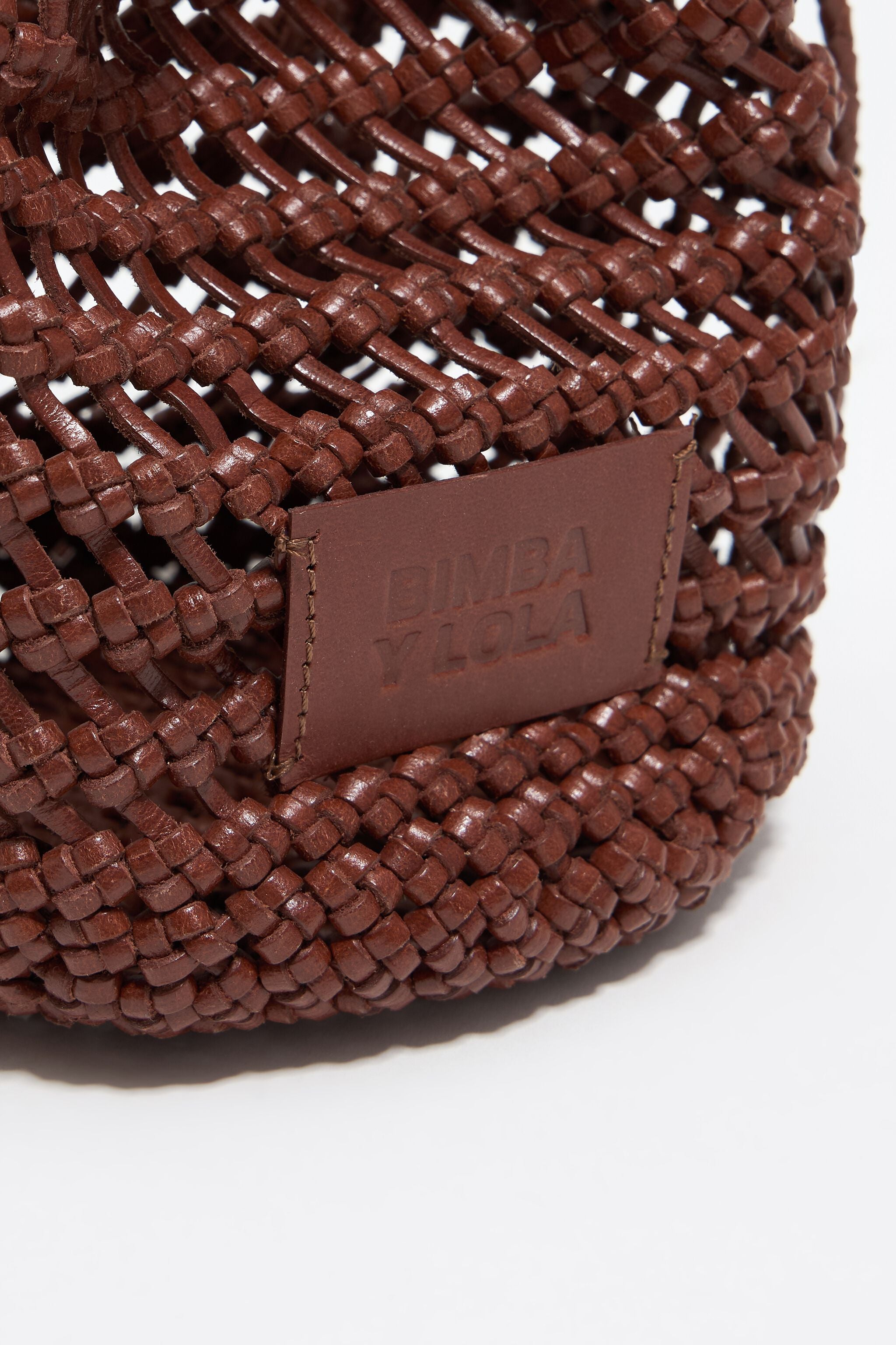 Small walnut plaited leather bucket bag
