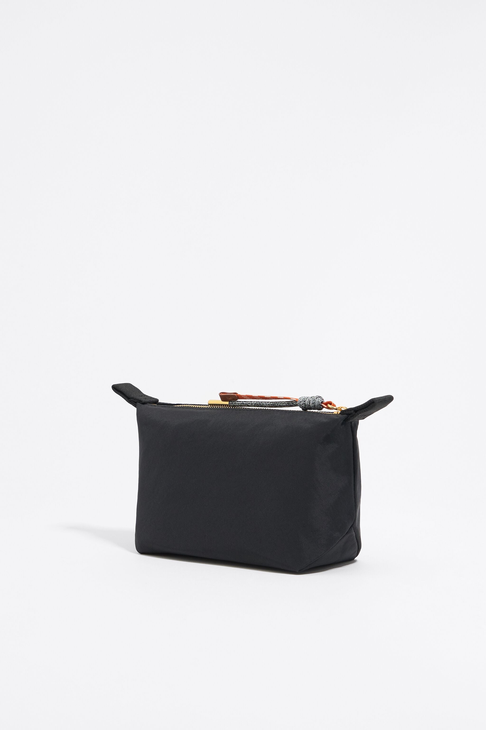 Small black nylon trapezium make-up case