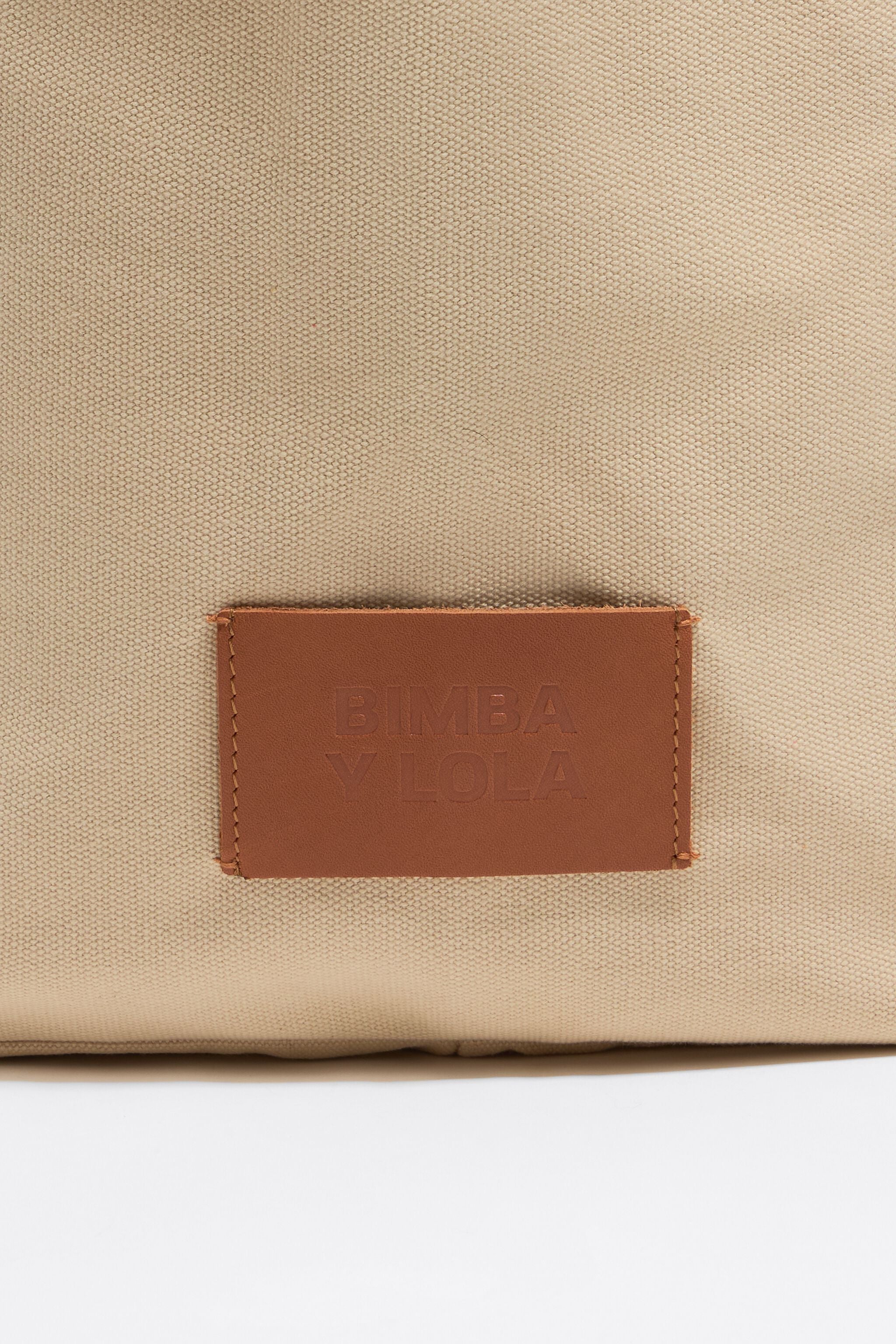 Large beige woven shopper bag