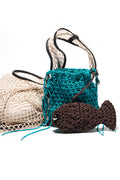 Turquoise plaited shoulder bag