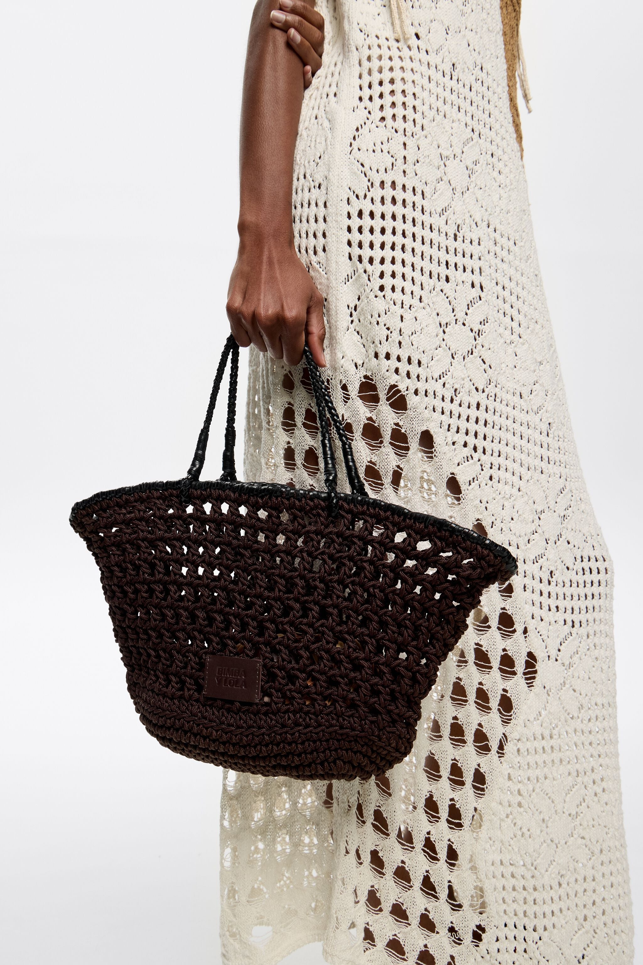Dark brown plaited leather handbag