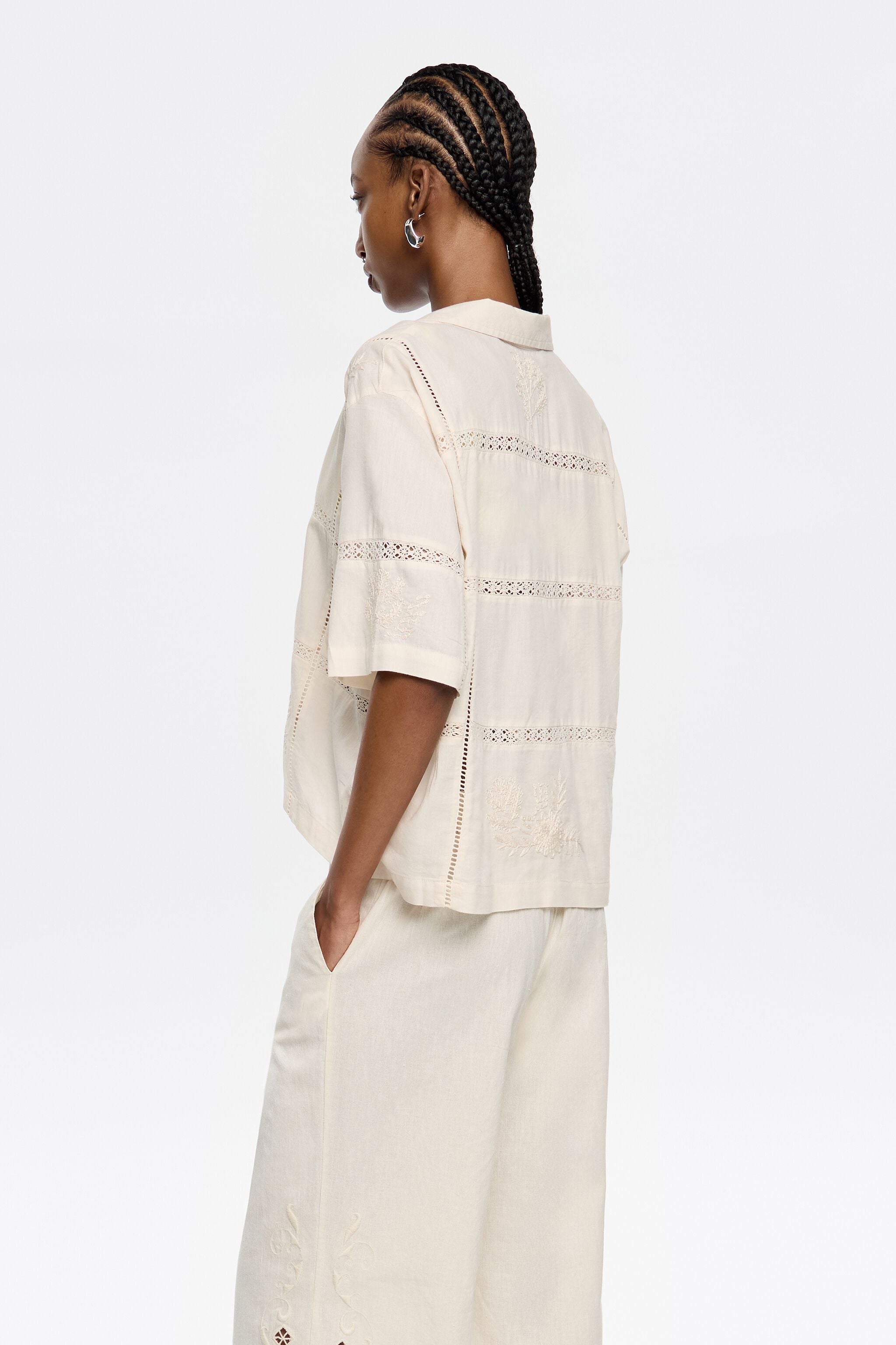 Cream shirt with bows and embroidery