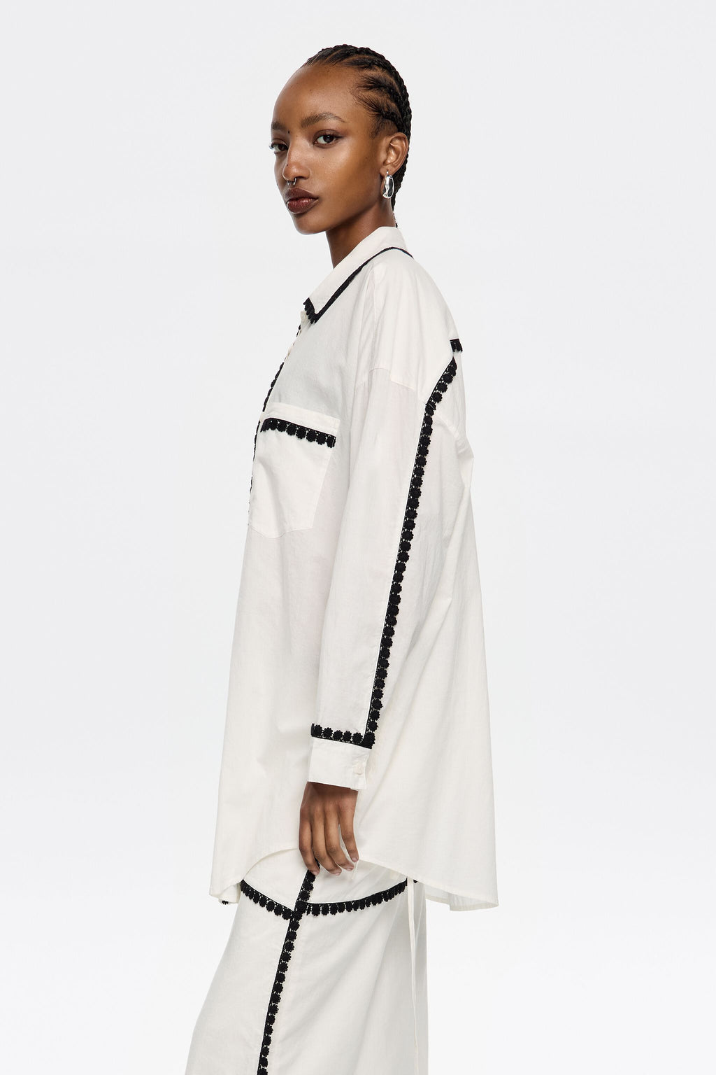 White shirt with raised embroidery