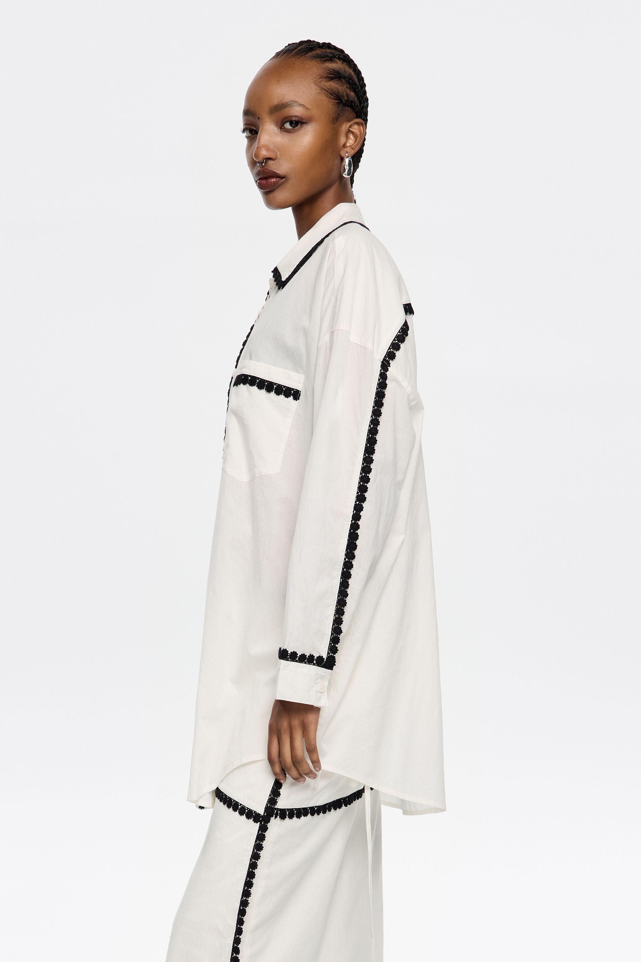 White shirt with raised embroidery