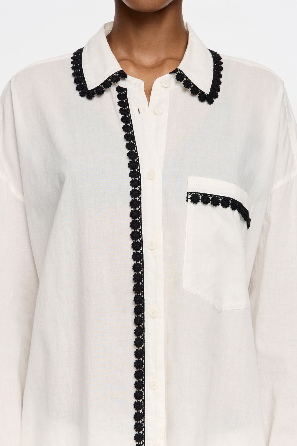 White shirt with raised embroidery