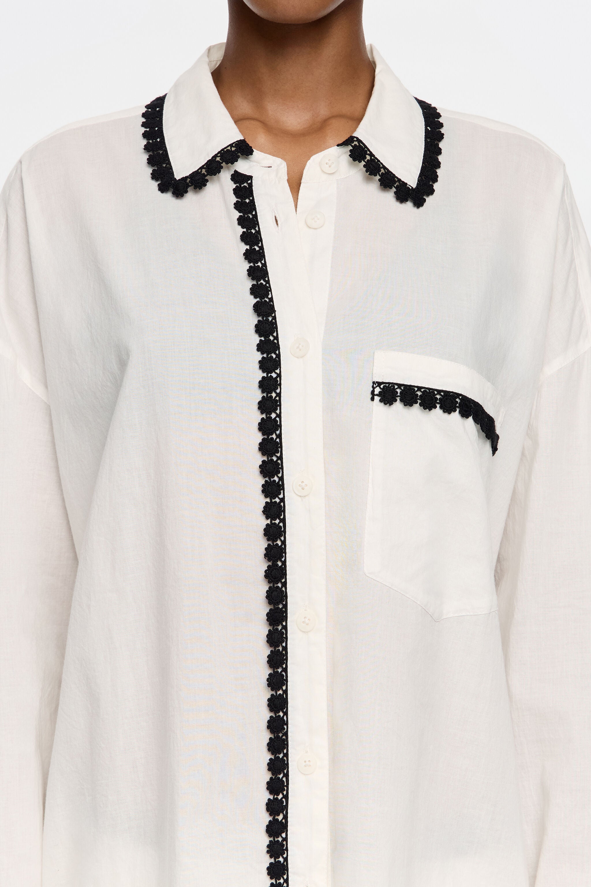 White shirt with raised embroidery