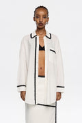White shirt with raised embroidery