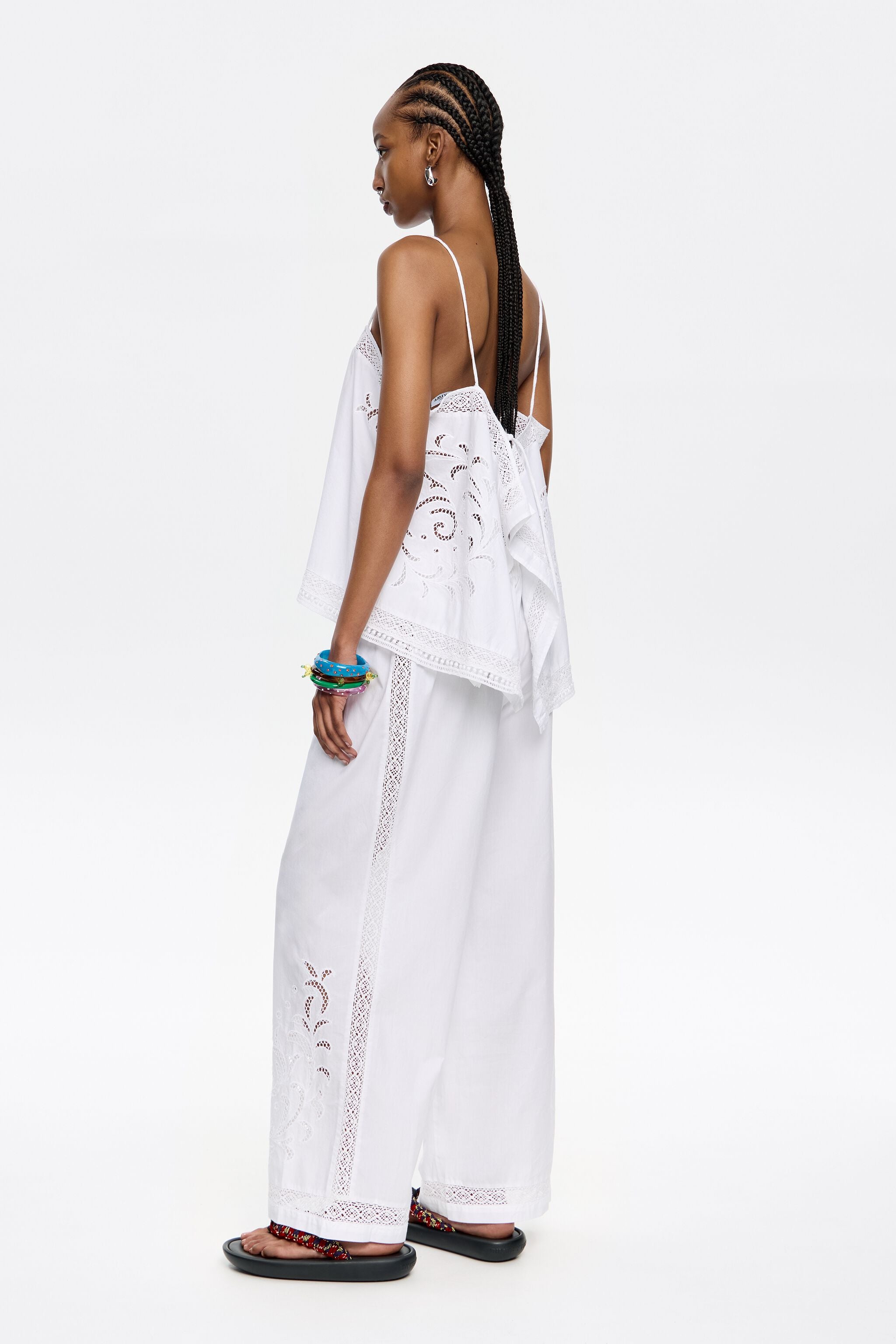 White embroidered jogger trousers