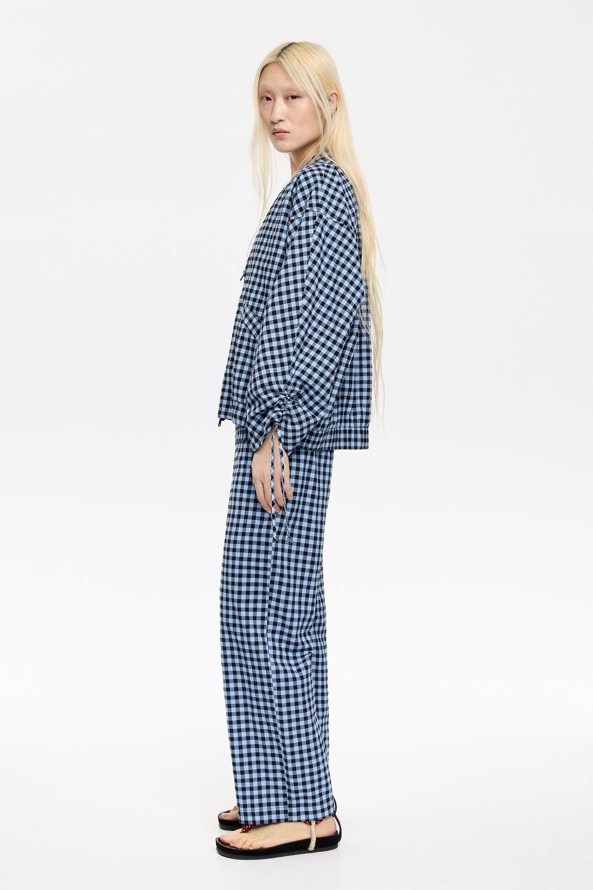 Powder blue checked textured straight trousers