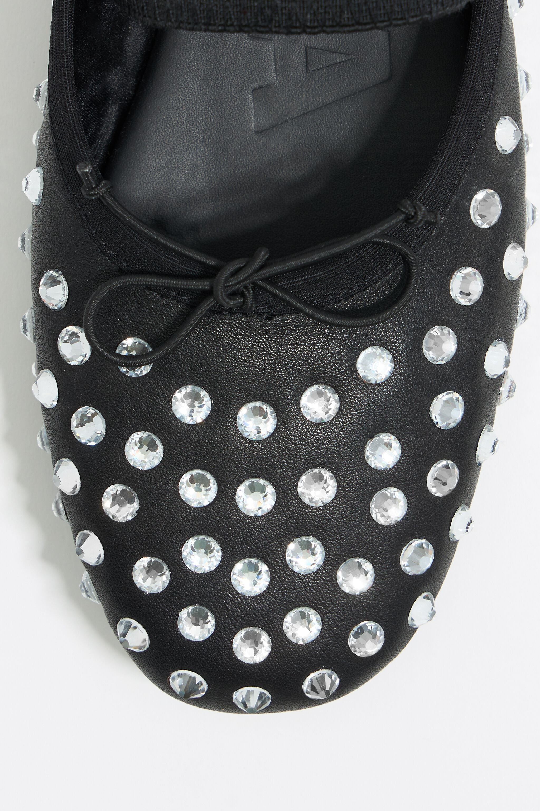 Black leather and crystals slingback ballerina