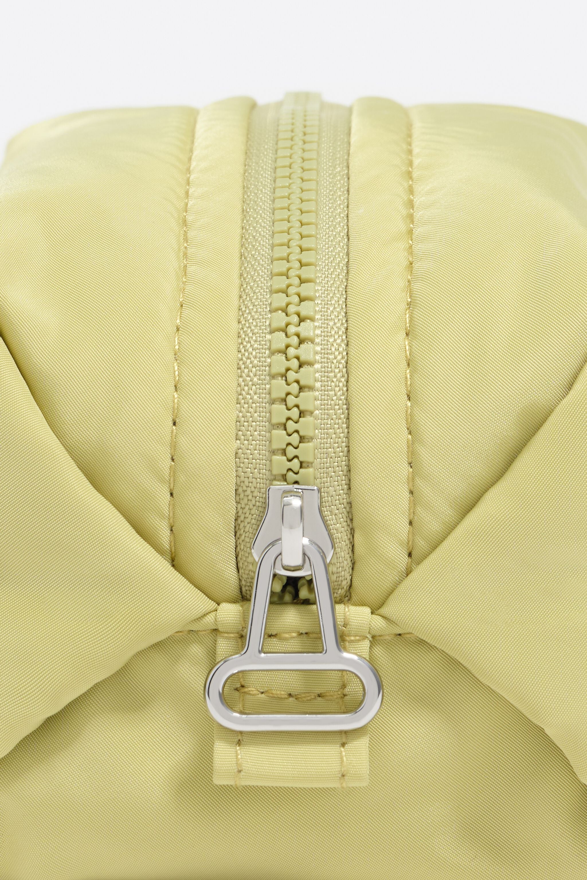 Small pale lime nylon make-up case